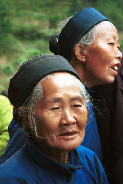 Close up of two Lao Han women in the Black Miao village of Dai Lo, Shi Zi township, Ping Ba county 15km east of the Puding county border in Guizhou province, South West China 0010z29A.jpg