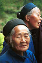 Jpeg 23K Close up of two Lao Han women in the Black Miao village of Dai Lo, Shi Zi township, Ping Ba county 15km east of the Puding county border in Guizhou province, South West China 0010z29A.jpg