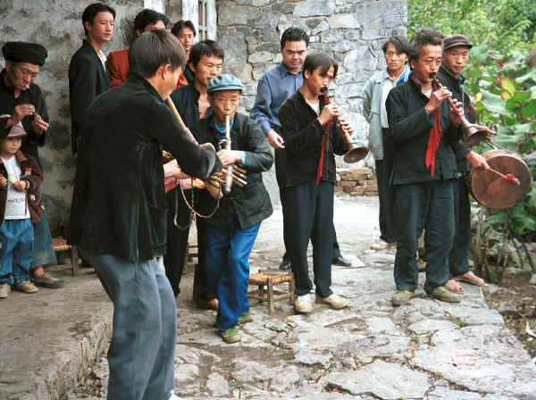 Side comb Miao musicians performing for us during our visit to Long Dong village, De Wo township, Longlin country, Guangxi province 0010f07.jpg